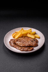 Steak, grilled beef, sirloin cooked on the barbecue with salt and spices