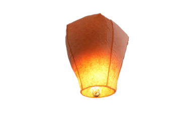 Small orange lantern is lit up and floating in the air