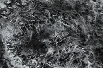 Texture of grey wool fabric as background, top view