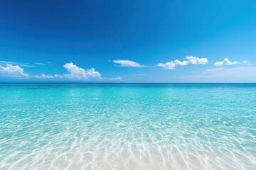 Obraz premium Crystal clear sea water and white sandy beach create a serene tropical paradise under a bright blue sky, Crystal clear sea water and tropical beach Serenity and calmness background
