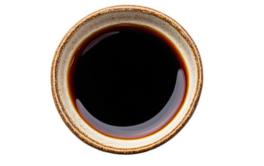 Bowl of coffee with a brown liquid in it