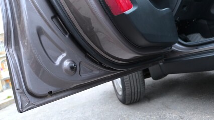 open car doors looking down at paint quality