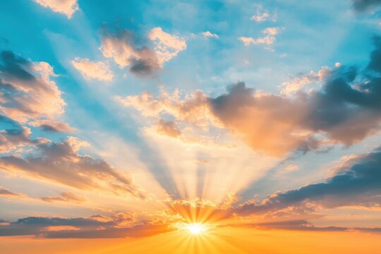 Dramatic sunset with sun rays piercing through clouds at twilight, Dramatic sky with sunrays piercing through clouds at sunrise or sunset