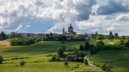 Idyllic Italian rural landscape with lush green vineyards