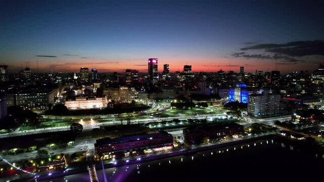Sunset Casa Rosada In Buenos Aires Argentina. Aerial View Of A High-Rise Buildings And Traffic Showcasing Urban Life. Building Illumination Urban. Town Drone View Up Above. Buenos Aires Argentina.