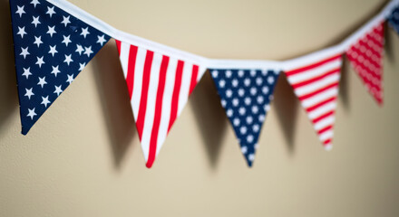 Fototapeta premium Decorative bunting with red, white, and blue triangles for celebrations 