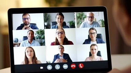 Digital video conference with diverse business team on laptop screen. Remote work meeting connects multicultural professionals in virtual grid interface. Corporate employees collaborate through online - Powered by Adobe