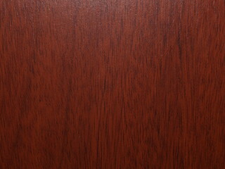Fototapeta premium Glossy reddish brown wood texture with horizontal grain lines