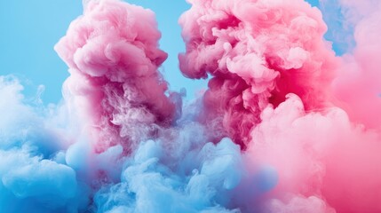 Fototapeta premium Colorful Smoke Clouds in Blue and Pink Against a Bright Background
