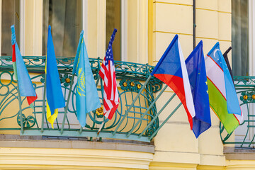 International flags on balcony displaying multicultural unity