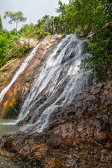 Na mueang waterfall or Na muang 1 waterfall can be seen in the middle of a jungle setting located on the Thai island of Ko Samui