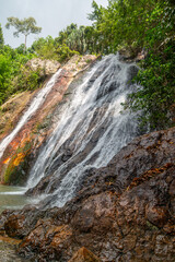 Na mueang waterfall or Na muang 1 waterfall can be seen in the middle of a jungle setting located on the Thai island of Ko Samui