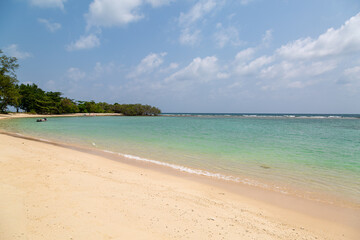 Ko Samui beach, Image shows the tropical beach with clear turquoise ocean on a calm relaxing day