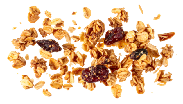 Granola chunks and cranberries falling on transparent background