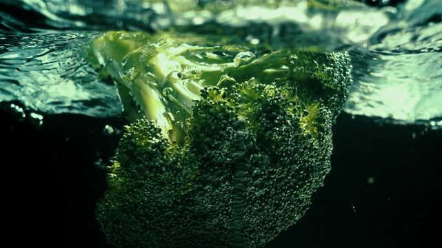 Broccoli Falls in Water in Slow Motion