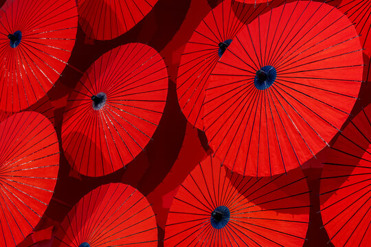 Red paper parasols on display, Arashiyama, Kyoto, Japan