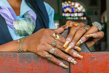 Cuba, Havana. Old Havana, Habana Vieja, Street vendors, fingernails, highly decorated.