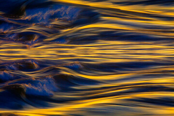 Canada, Montreal, Quebec. River reflecting autumn colors.