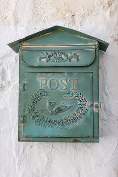Arcos de la Frontera, Seville Province, Andalusia, Spain. An old green letter box.