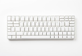 A white computer keyboard sitting on top of a table.