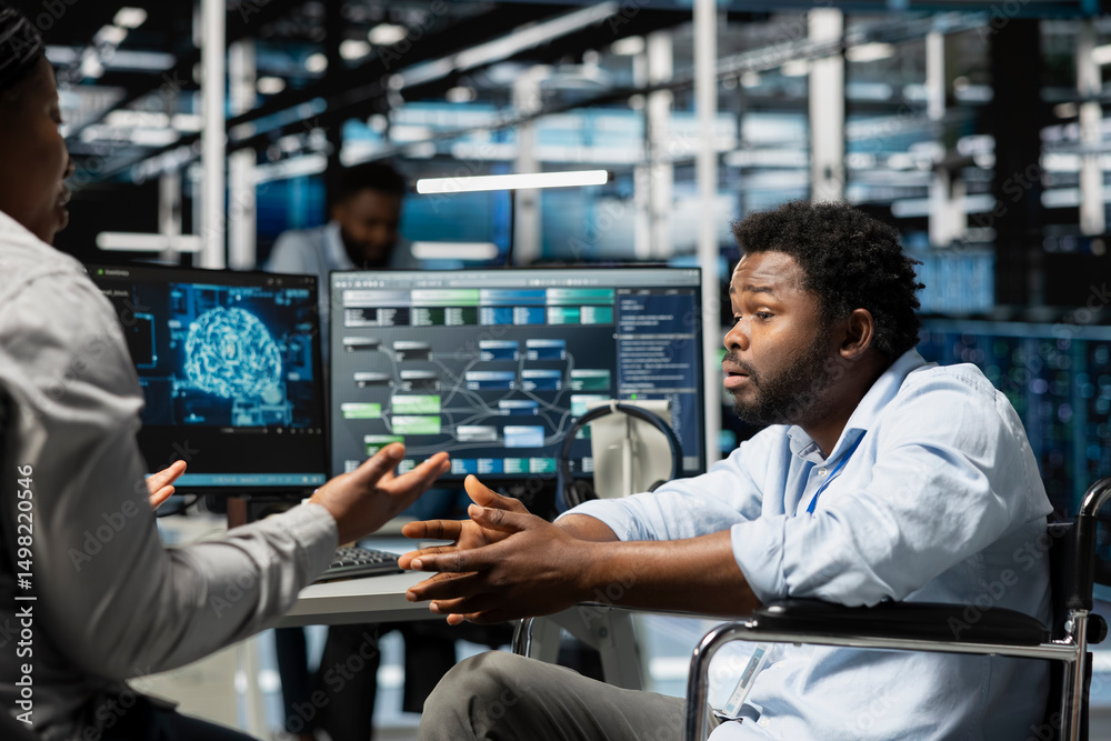 Poster engineer with disability and manager inspecting neural network data center used for machine learning