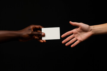 Obraz premium hand, card, business, blank, holding, paper, showing, finger, sign, empty, message, advertisement, hold, businessman, note, business card, greeting, communication, presentation, person, space, adverti