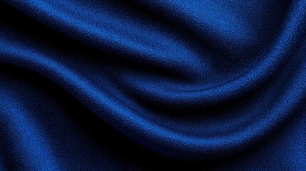Fototapeta premium Detailed image displaying flowing blue fabric with elegant folds and curves