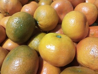 Fresh tangerine bounty for natural vitamin c boost and culinary delight. Orange fruit background
