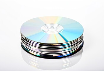 A stack of cds sitting on top of each other.