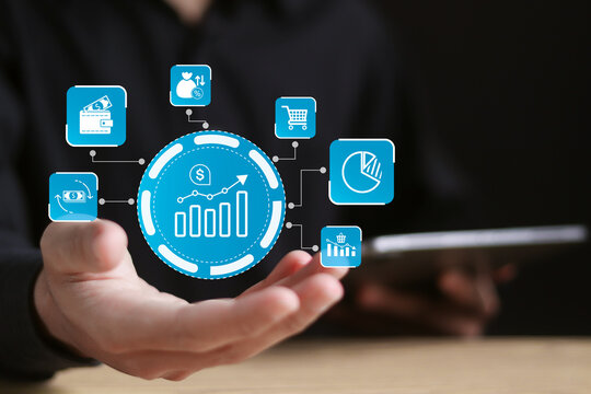 Inflation concept. Financial graph showing statistics, stock market crash, crisis, inflation rate. Businessman holding icon of increasing inflation rate on virtual screen.