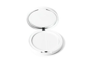 A compact powder compact with a mirror on top.
