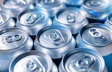 Aluminum cans in modern beer factory production line at warehouse
