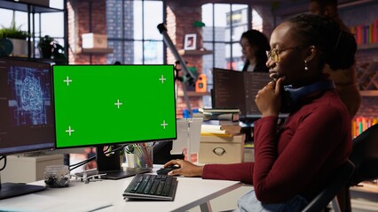 Naklejka premium Isolated screen PC in workspace used by AI researcher working with artificial intelligence technology. Mockup computer monitor used by employee developing AI systems in tech startup, camera B