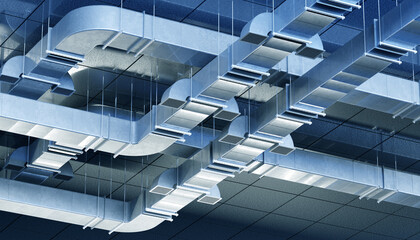 Modern HVAC ductwork system on a commercial ceiling, used for air ventilation and climate control in buildings. HVAC. Construction. Building infrastructure.
