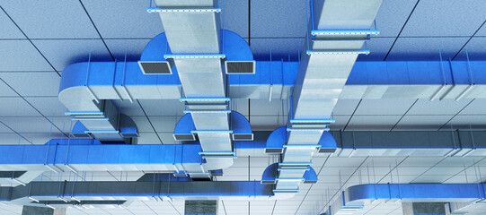 Ceiling-mounted industrial HVAC duct system with multiple air vents, used for air circulation and temperature control in commercial buildings. HVAC. Construction. Infrastructure.