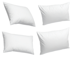Four pristine white pillows displayed, showcasing different shapes and positions