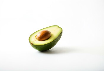 A half of an avocado cut in half on a white surface.