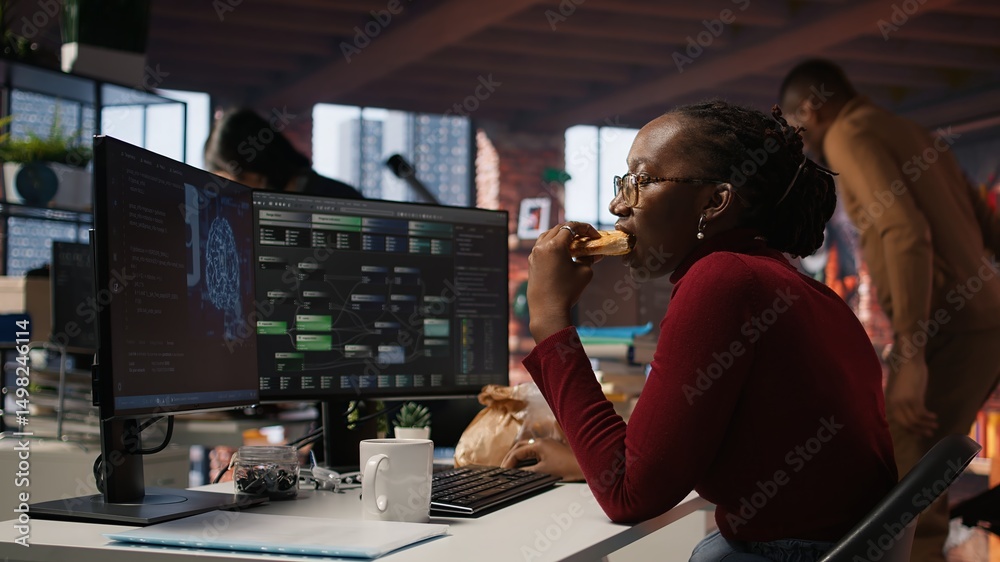 Poster it employee using programming languages on pc in ai startup office to build applications, enjoying s