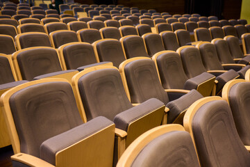Naklejka premium A visually appealing Empty Auditorium Seating arrangement showcasing Modern Chairs for events