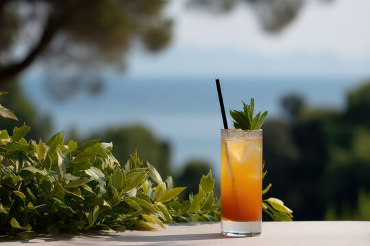 refreshing cocktail named sunny day placed elegantly on table surrounded by lush greenery with sparkling sea in
