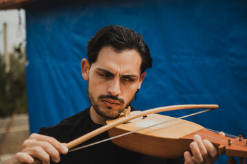 Focused Lyre Player Following The Music 