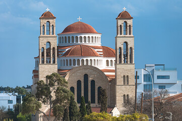 Church of Agion Anargyron rising in Paphos, Cyprus, under blue sky