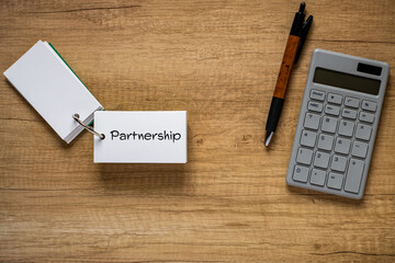 There is word card with the word Partnership. It is as an eye-catching image.