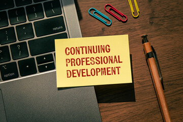 There is wood cube with the word Continuing Professional Development. It is as an eye-catching image.