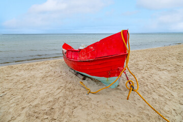 old wooden fishermens ship at the beach