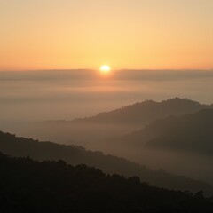 Tranquil sunrise over misty hills bathed in warm oranges and soft greens Perfect for serene nature or calming landscape concepts