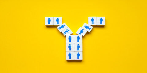 Yellow background with branching path of cubes showing decision making and strategic route planning