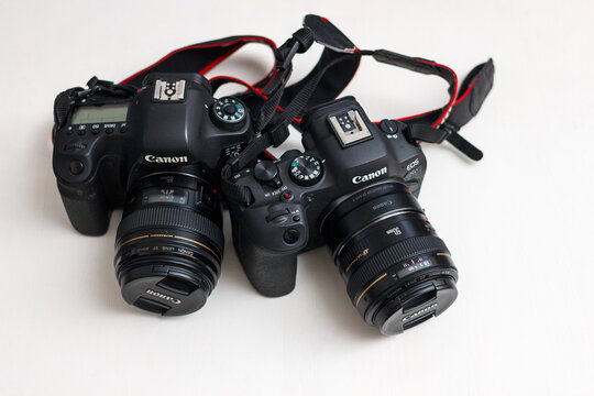 Editorial &ndash; Canon DSLR vs Mirrorless Camera Comparison &ndash; EOS 6D and EOS R6 Mark II with EF Lenses on White Background