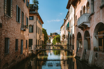 Cagnan Grande Canal Reflecting Buildings and Footbridge in Treviso, Italy