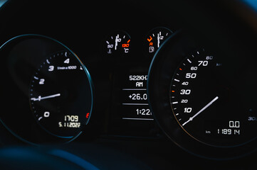 Close-up of Audi TT dashboard with analog and digital gauges

